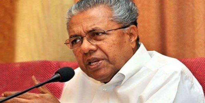 Kerala CM writes letter to PM Modi Karnataka restrictions