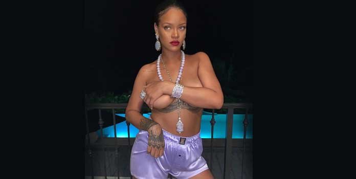 Rihanna goes topless wearing Ganesh pendant